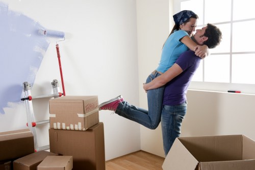 Professional packers carefully handling boxes
